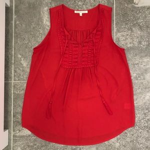 Red sleeveless Daniel Rainn